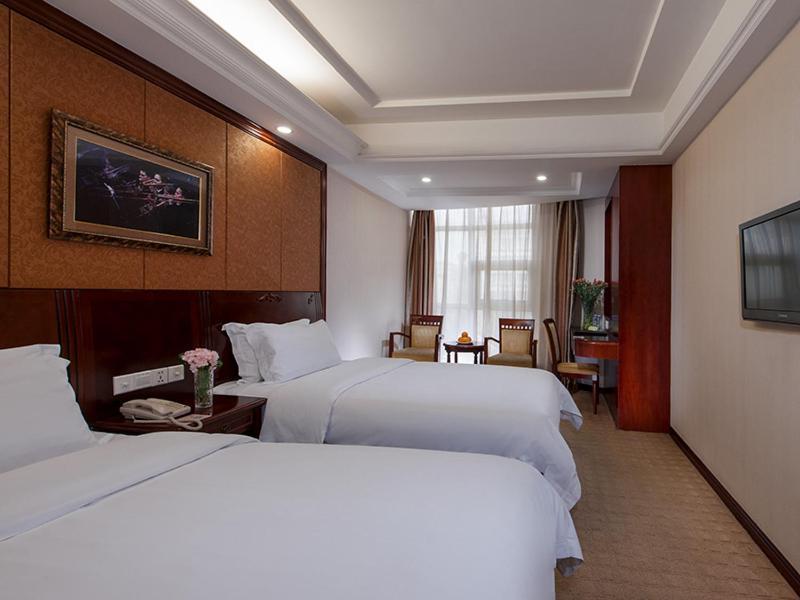 Vienna Hotel Shenzhen Pingdi Buitenkant foto